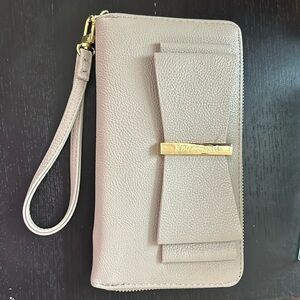 Gray Betsey Johnson clutch/wristlet. New never used but cut the tags off.